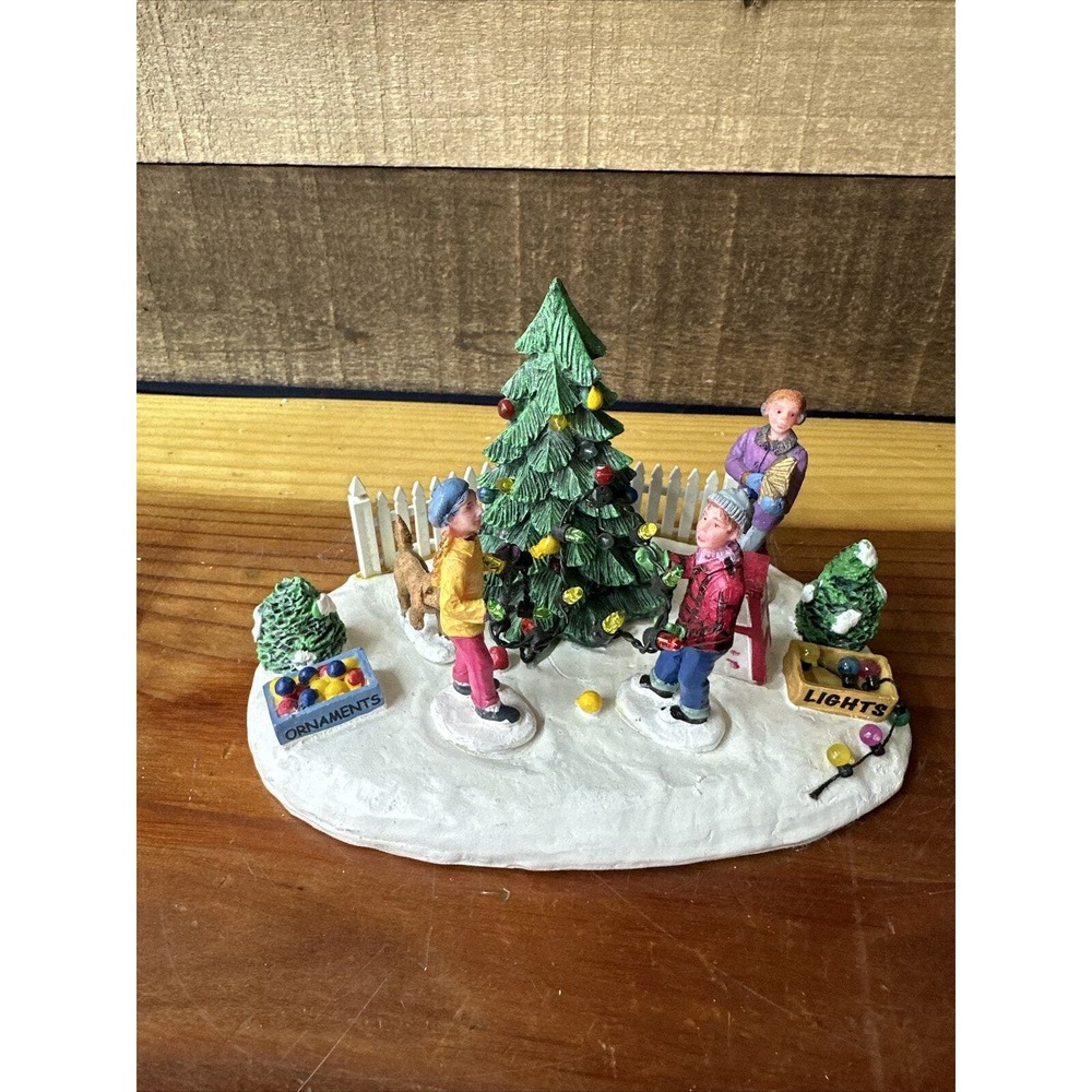 2009 Lemax Christmas Carole Towne Collection: Decorating Front Yard Tree, #94056